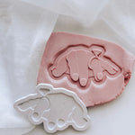 Female Ogre hand with engagement ring stamp and cutter