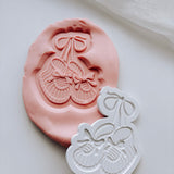Cute tied patterned baby booties stamp and cutter