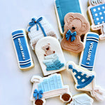 Stack of books with teddy on top stamp and cutter