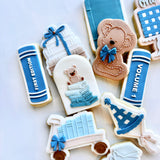 Stack of books with teddy on top stamp and cutter