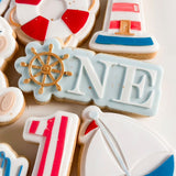 ONE with ship wheel “O” stamp and cutter