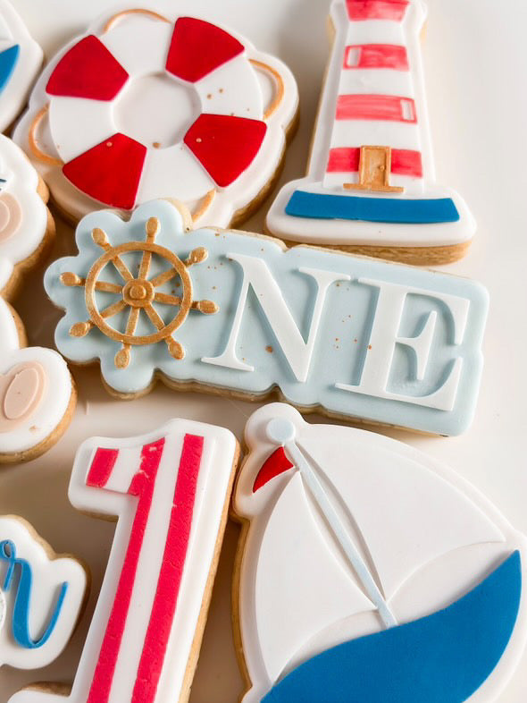 ONE with ship wheel “O” stamp and cutter