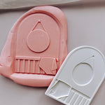 Cot with blanket and wall hanger arch stamp and cutter