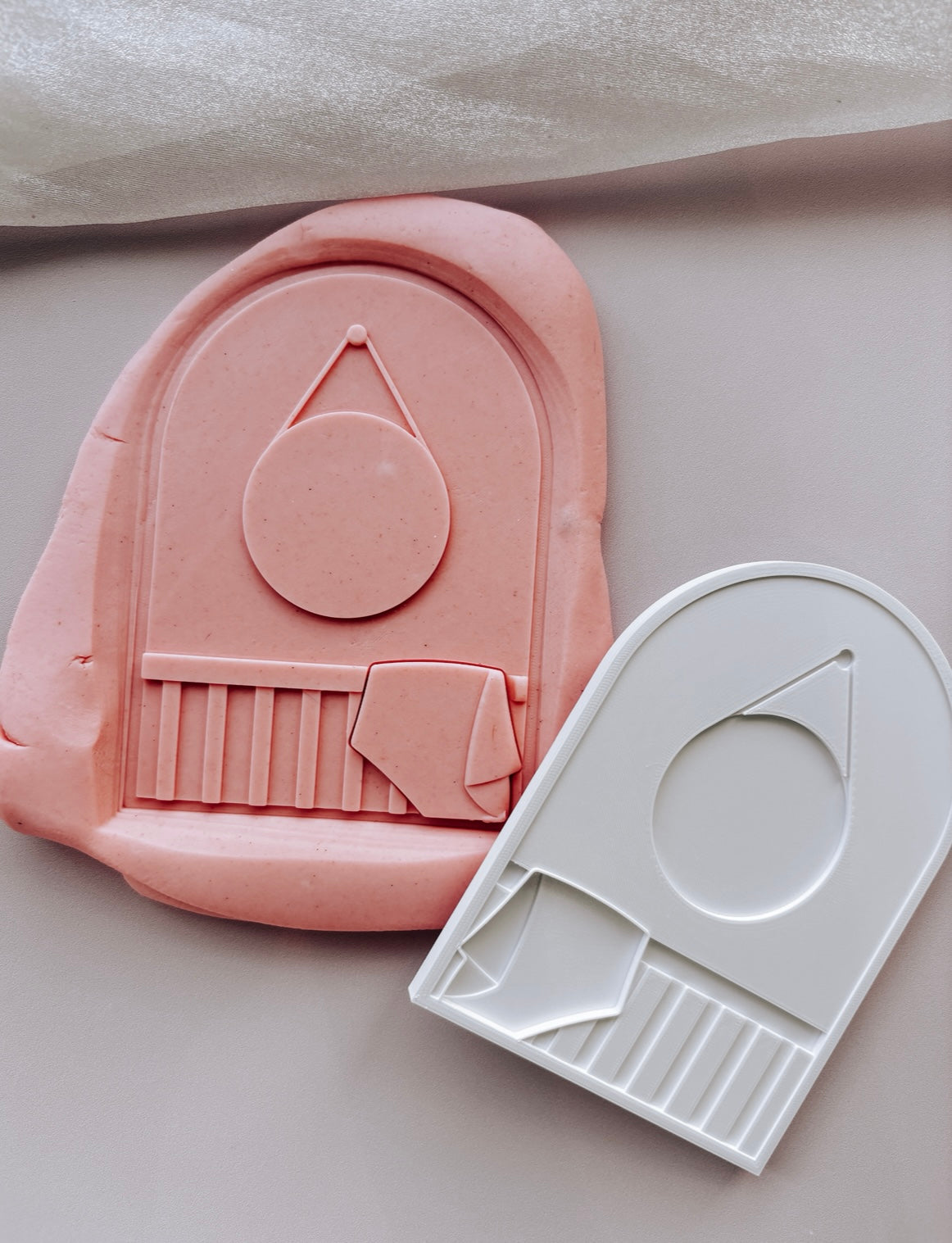 Cot with blanket and wall hanger arch stamp and cutter