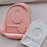 Cot with blanket and wall hanger arch stamp and cutter