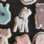 Standing deer with floppy bow