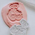 Cute tied plain baby booties stamp and cutter