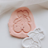 Girls boxing gloves with bow stamp and cutter