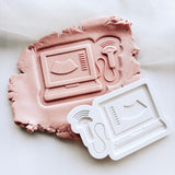 Ultrasound machine stamp and cutter