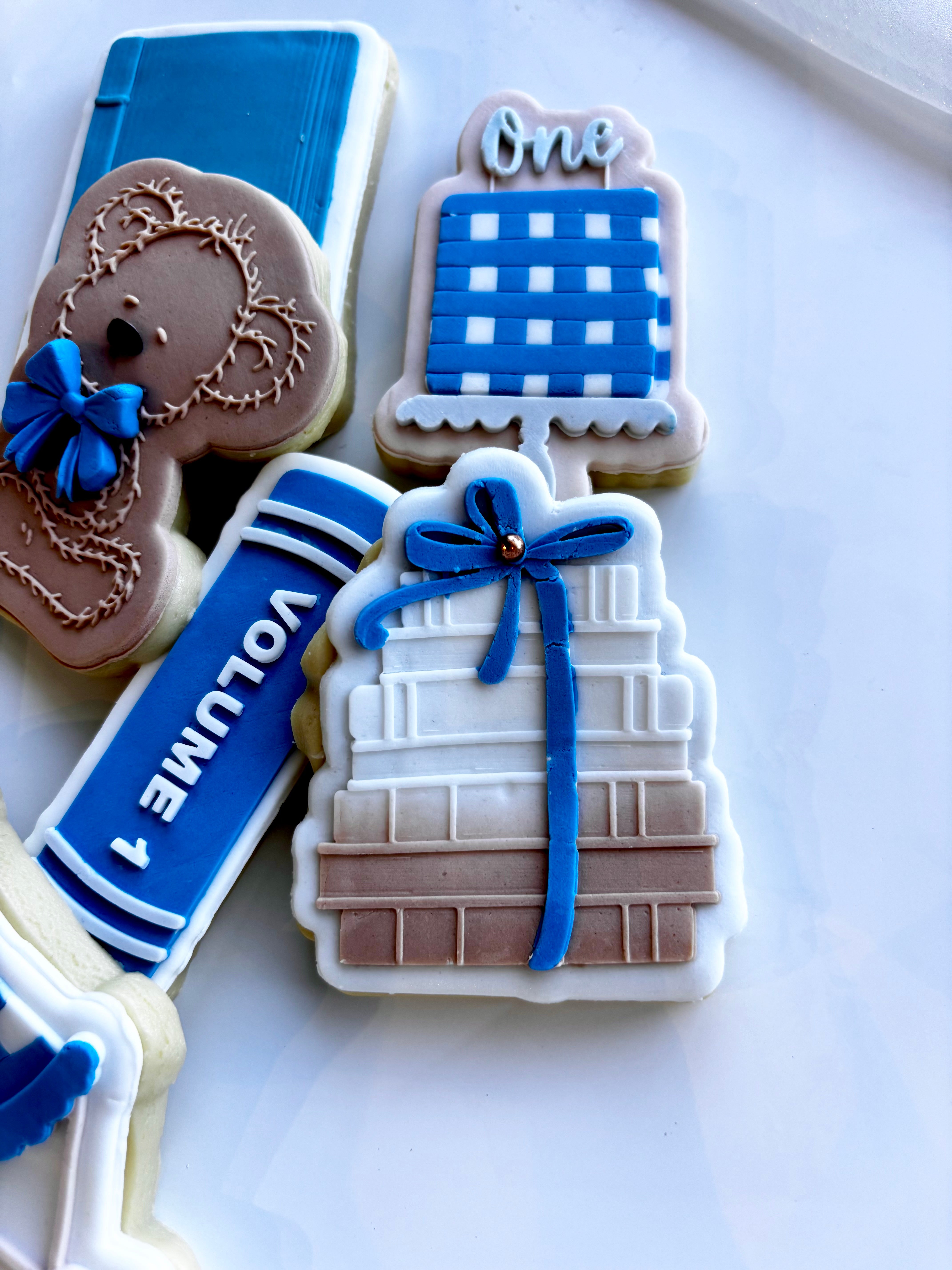 Stack of books with bow stamp and cutter