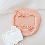 Plaque with greenery debosser and cutter