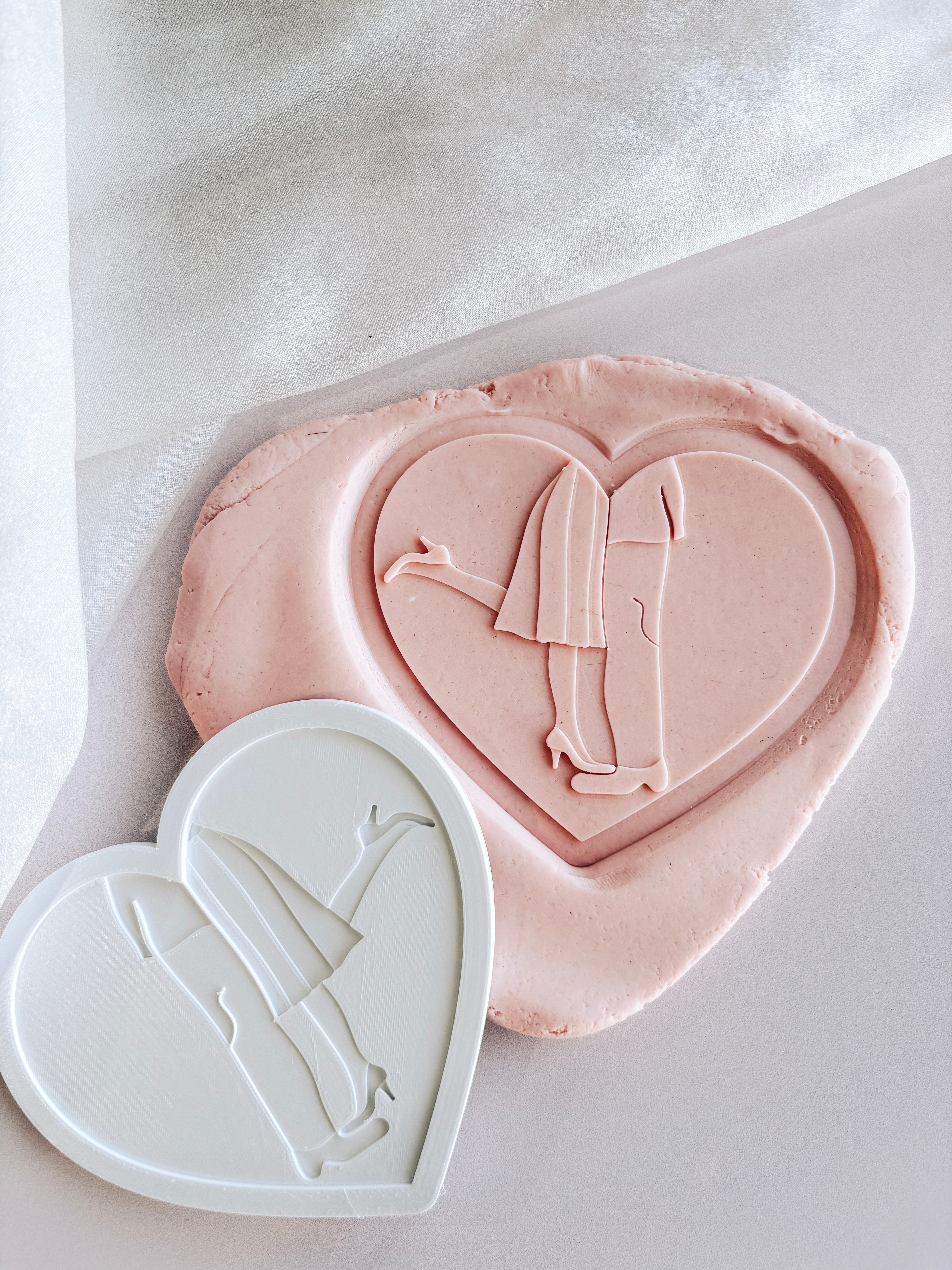 Foot popping kiss in heart stamp and cutter