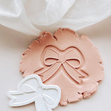 Cute bow debosser and cutter