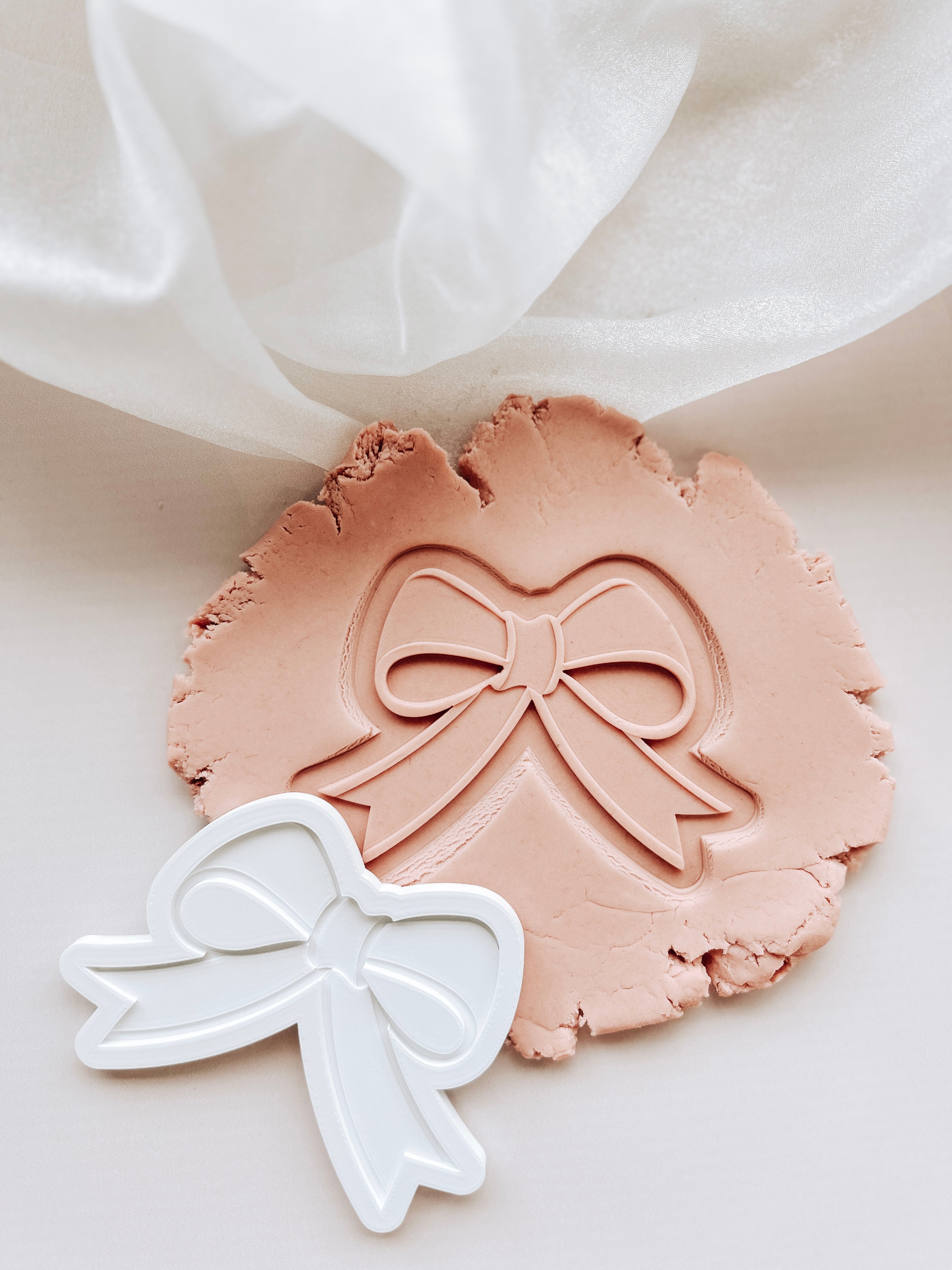 Cute bow debosser and cutter
