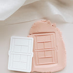 Tennis court stamp and cutter