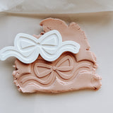 Delicate bow debosser and cutter