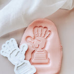 Hand themed trophy stamp and cutter