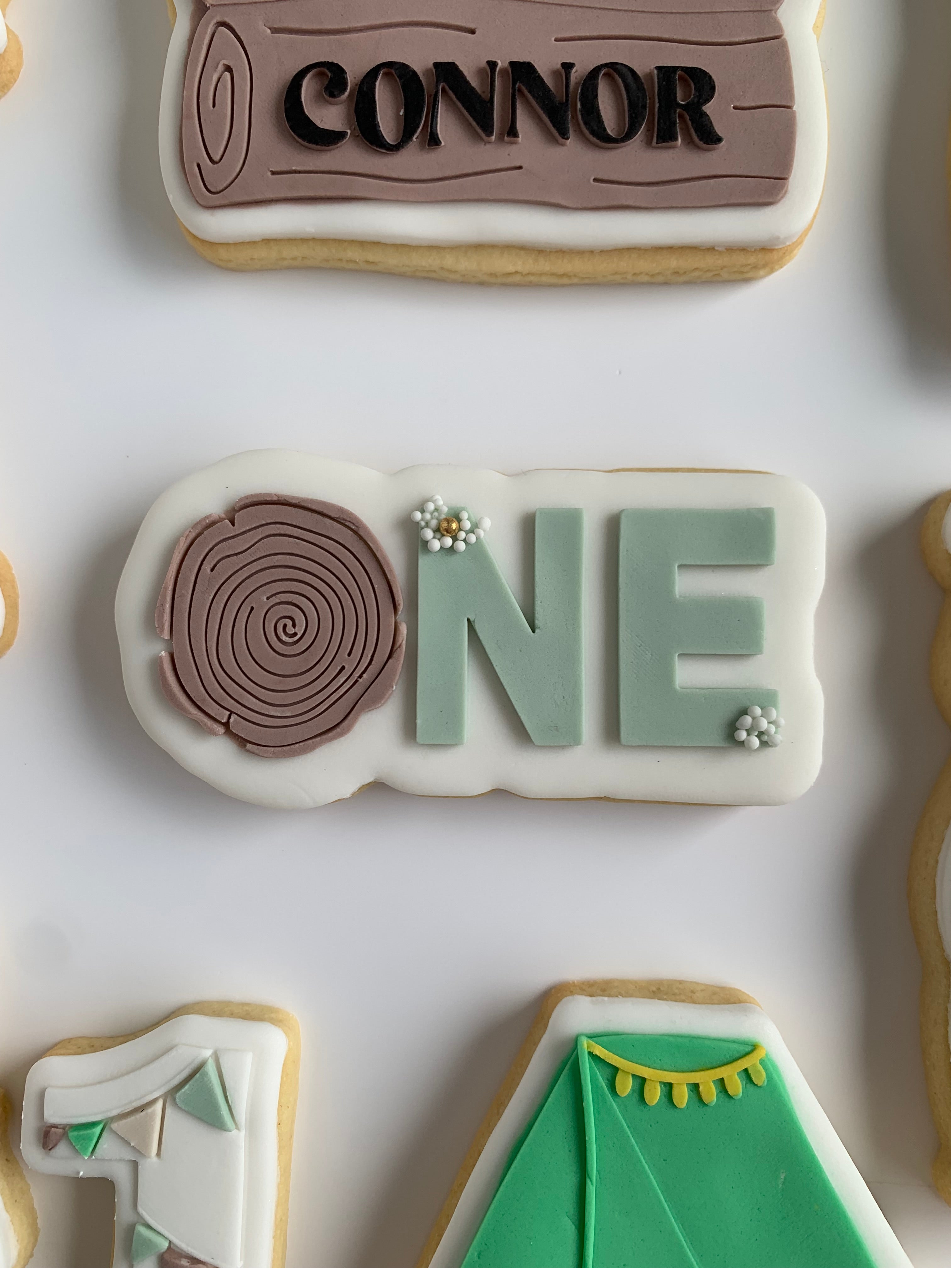 ONE with wooden stump ’o’ stamp and cutter