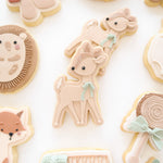 Standing deer with floppy bow