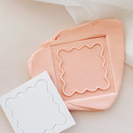 Square wavy border pop debosser