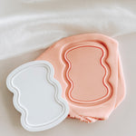 Wavy sign debosser and cutter