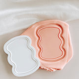 Wavy sign debosser and cutter