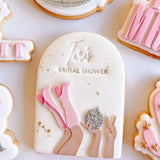 Go Go boots and disco ball in arch debosser and cutter