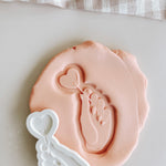 Heart lollipop in hand debosser and cutter