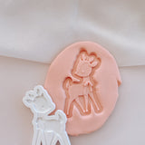 Standing deer with floppy bow