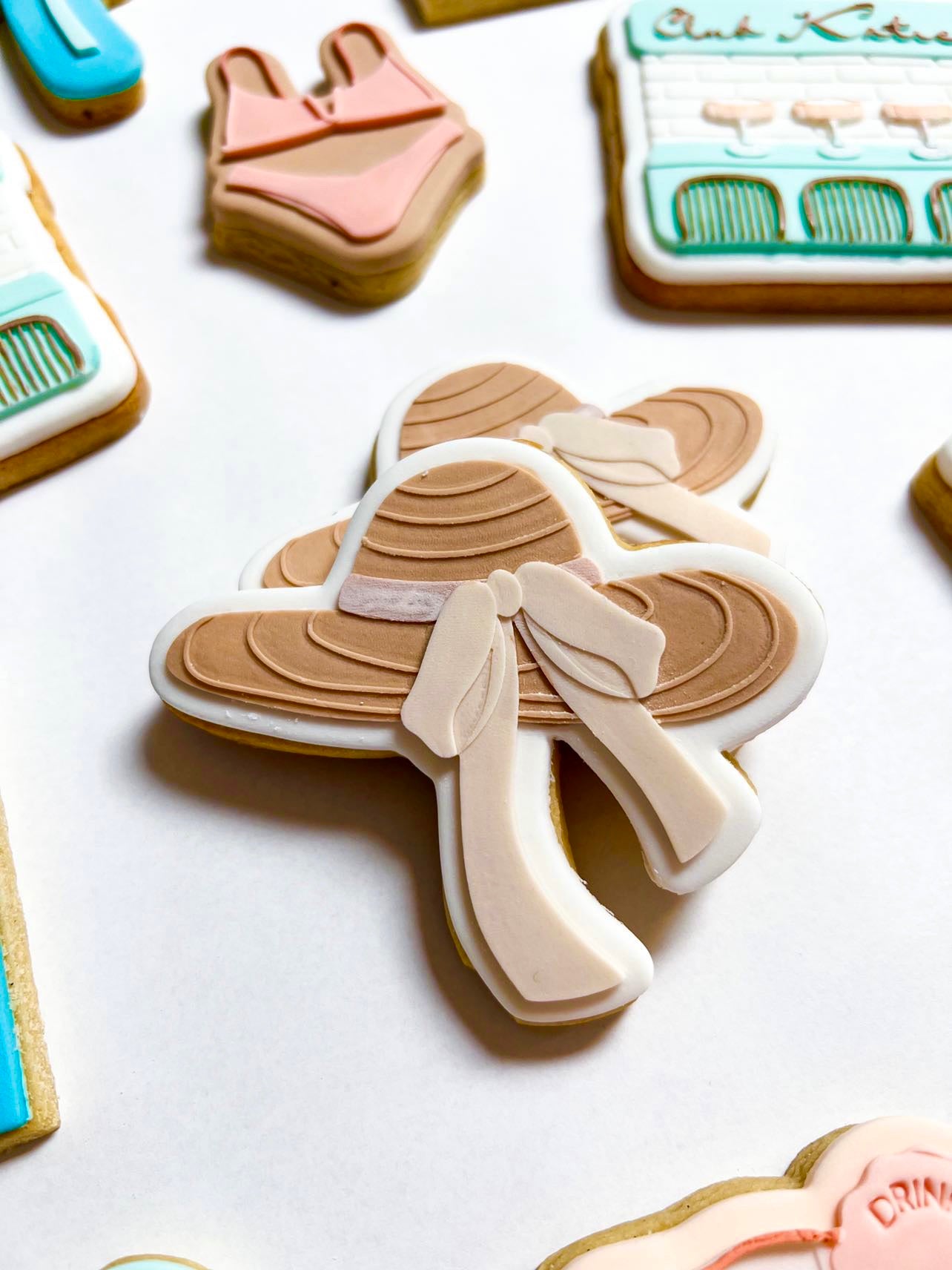 Beach hat with floppy bow debosser and cutter