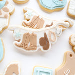 Cowboy hanger rack debosser and cutter