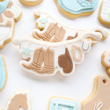 Cowboy hanger rack debosser and cutter