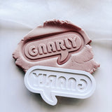 Gnarly font in speech stamp & cutter