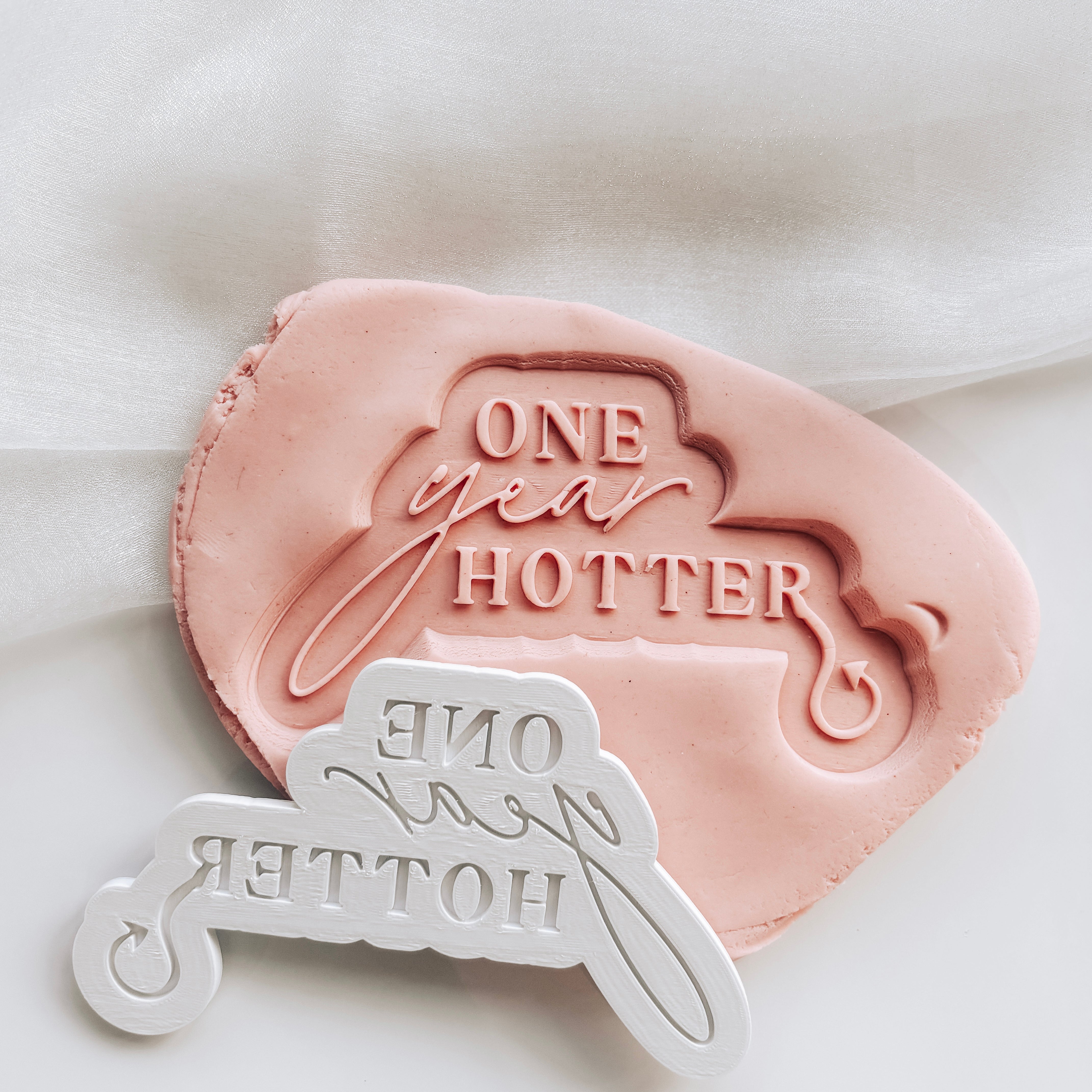 One year hotter stamp and cutter