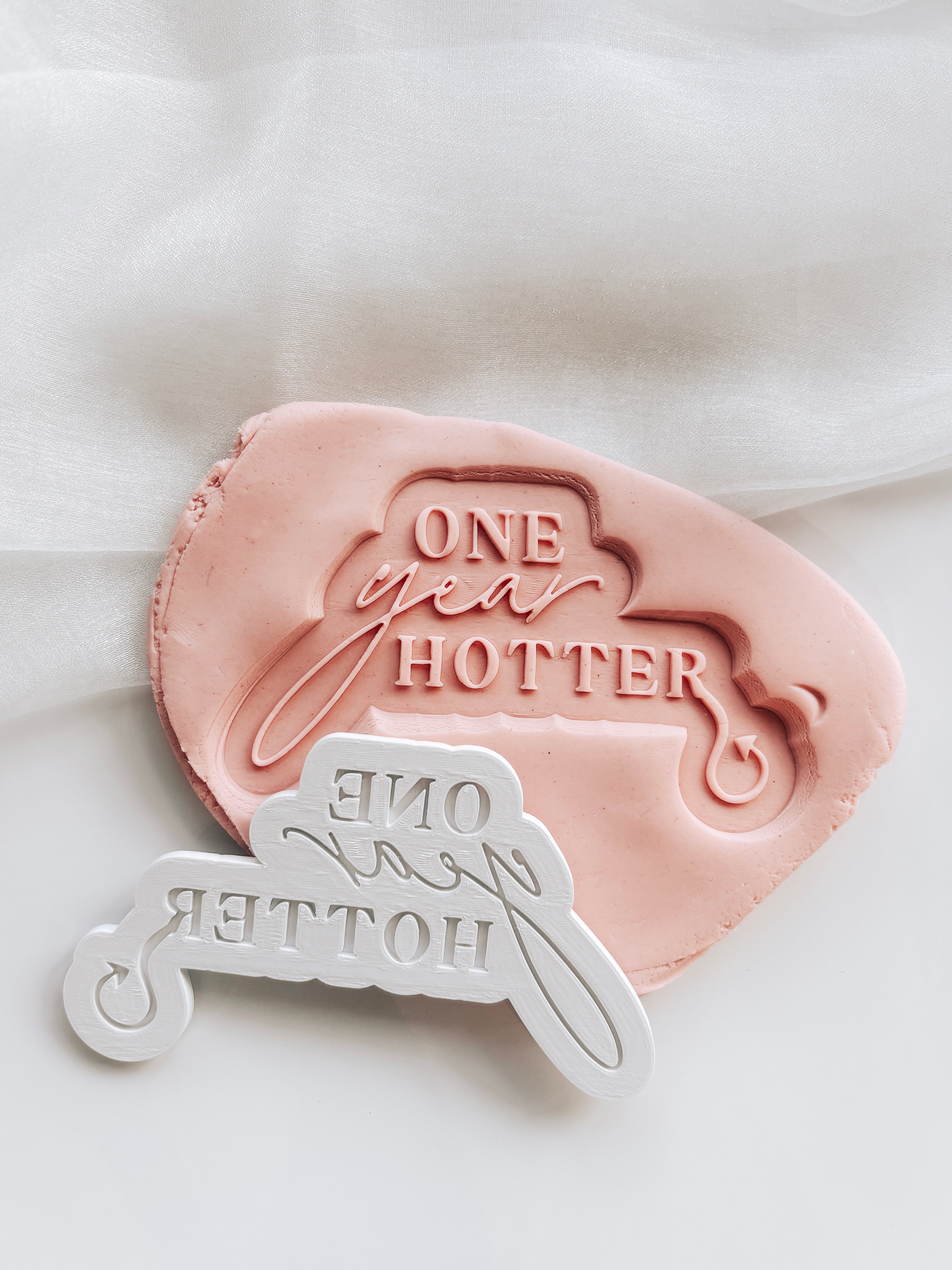 One year hotter stamp and cutter