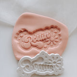 Rolling into ___debosser stamp and cutter