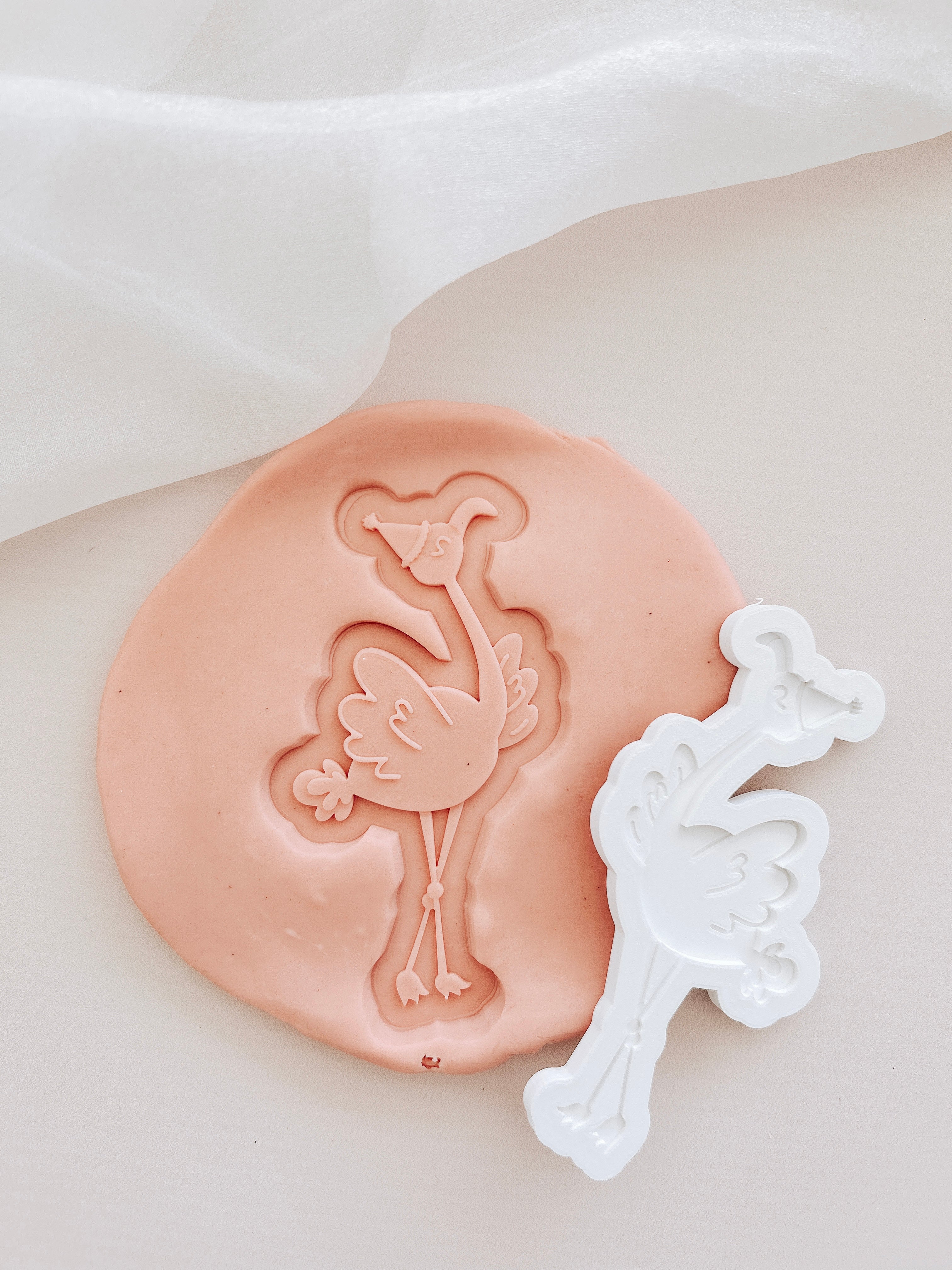 Dancing flamingo with party hat debosser and cutter