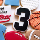 Sports themed number stamp and cutter