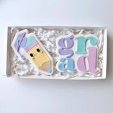 Cute pencil with grad hat stamp & cutter