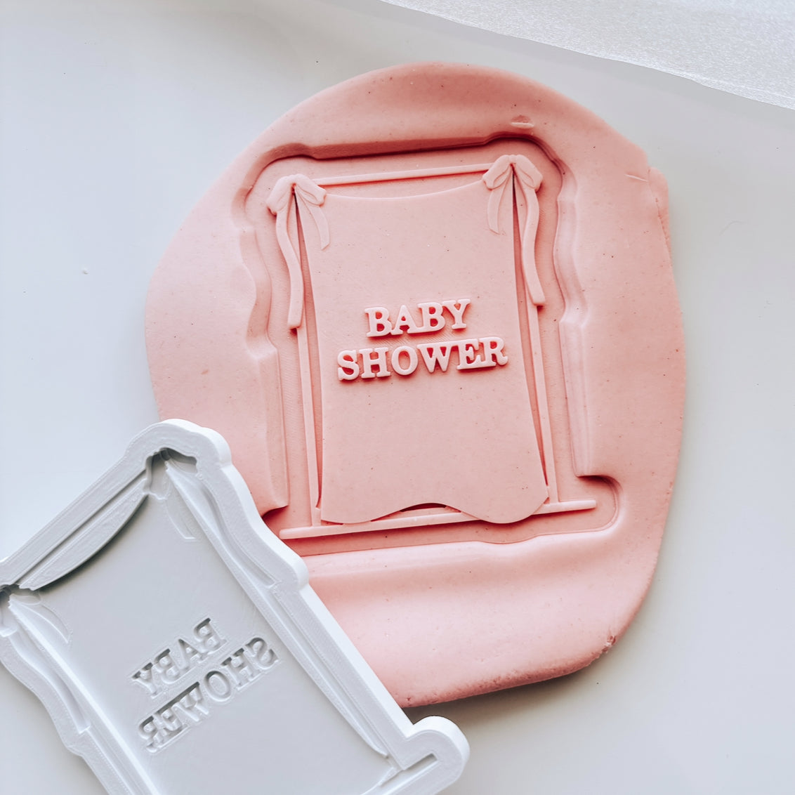 “BABY SHOWER” Draped material frame with bow on rectangle based stamp and cutter