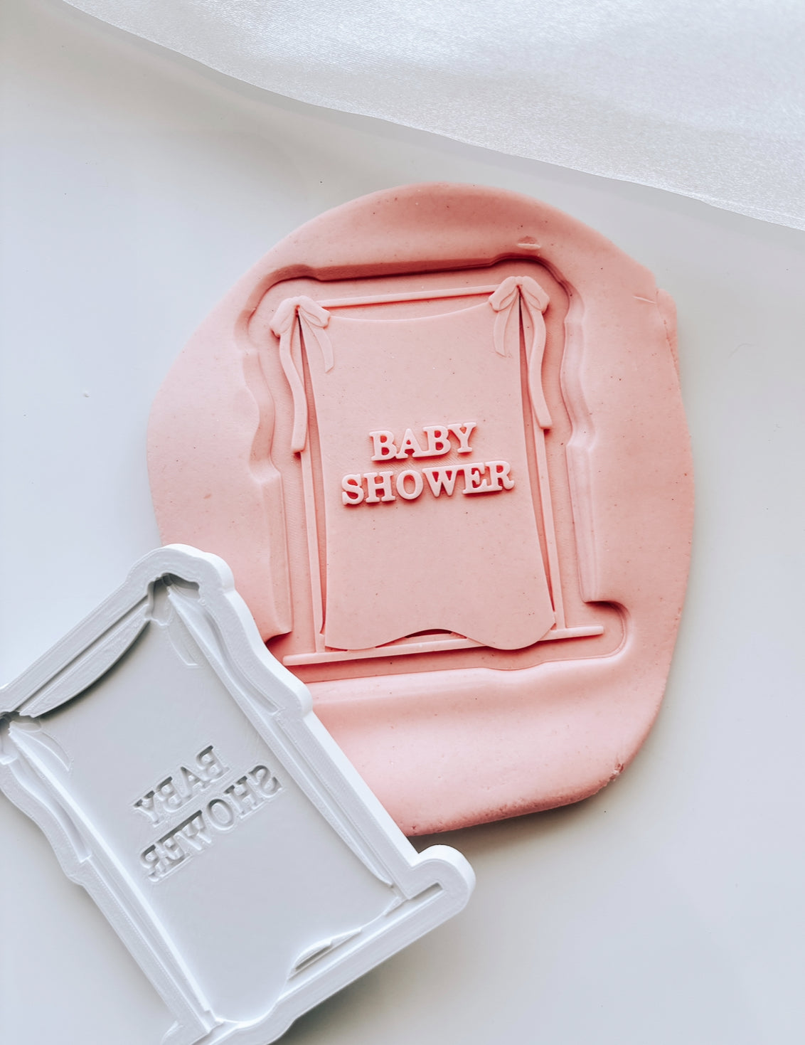 “BABY SHOWER” Draped material frame with bow on rectangle based stamp and cutter