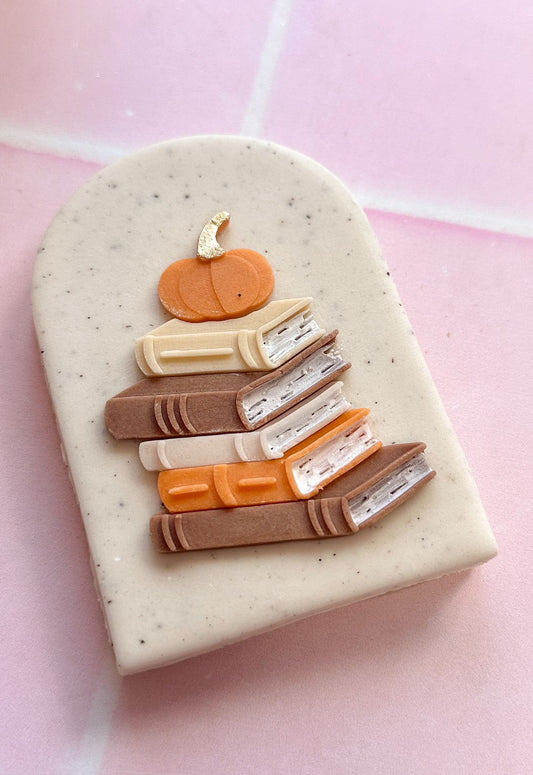 Book stack with pumpkin stamp & cutter