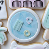Rounded swimming pool with floaties stamp and cutter