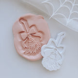 Broomstick with bow stamp and cutter