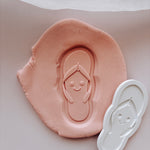 Single thong or plugger with smiley face Debosser stamp and cutter