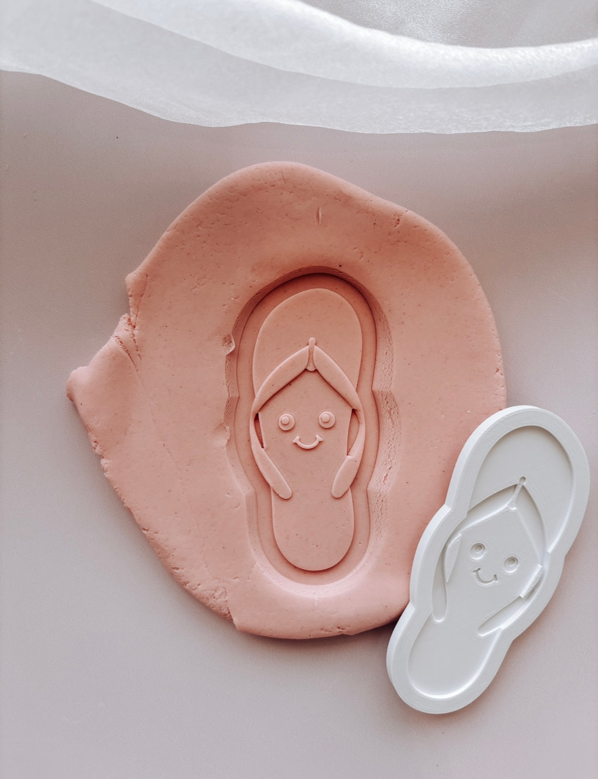 Single thong or plugger with smiley face Debosser stamp and cutter