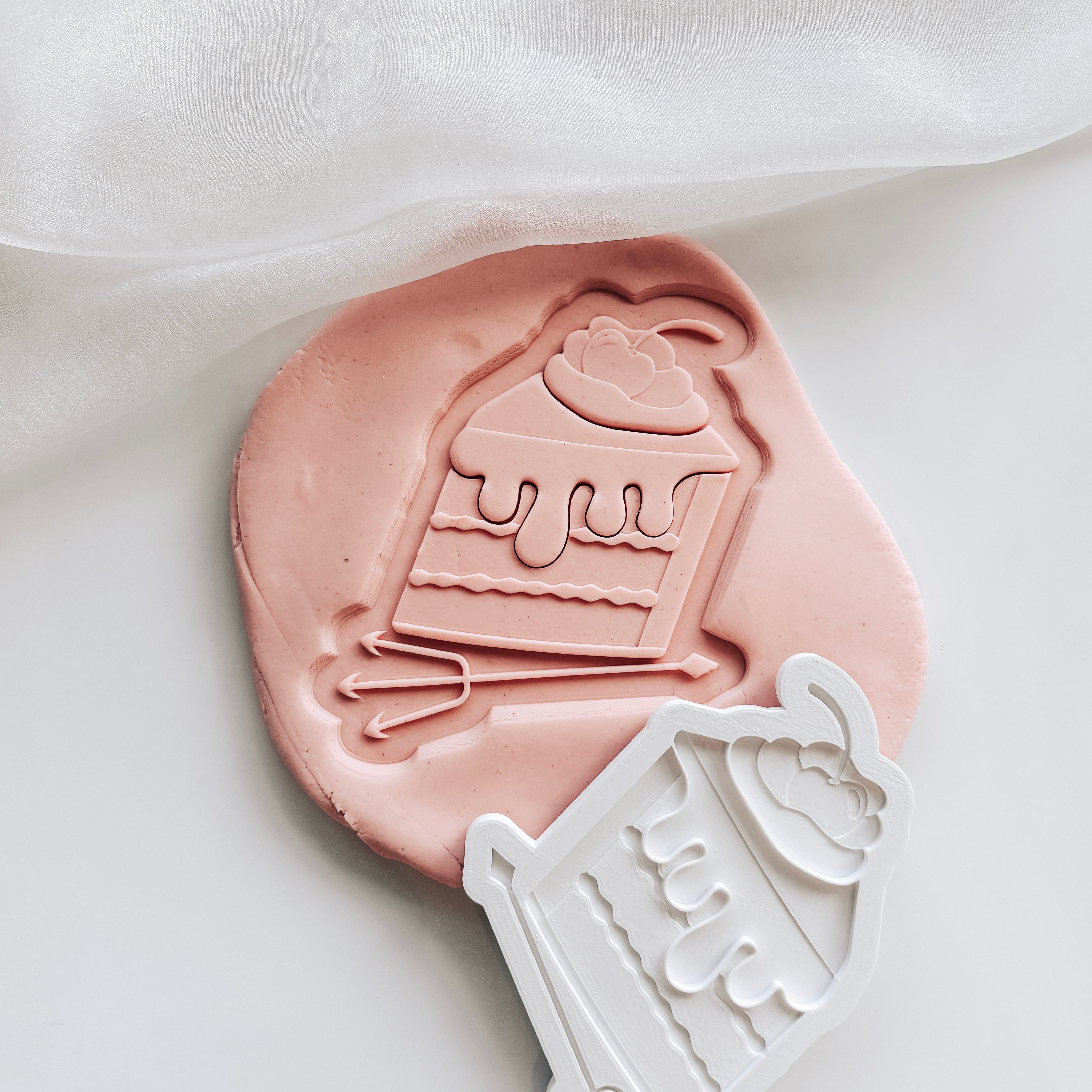 Velvet cake with devils pitchfork fork stamp and cutter