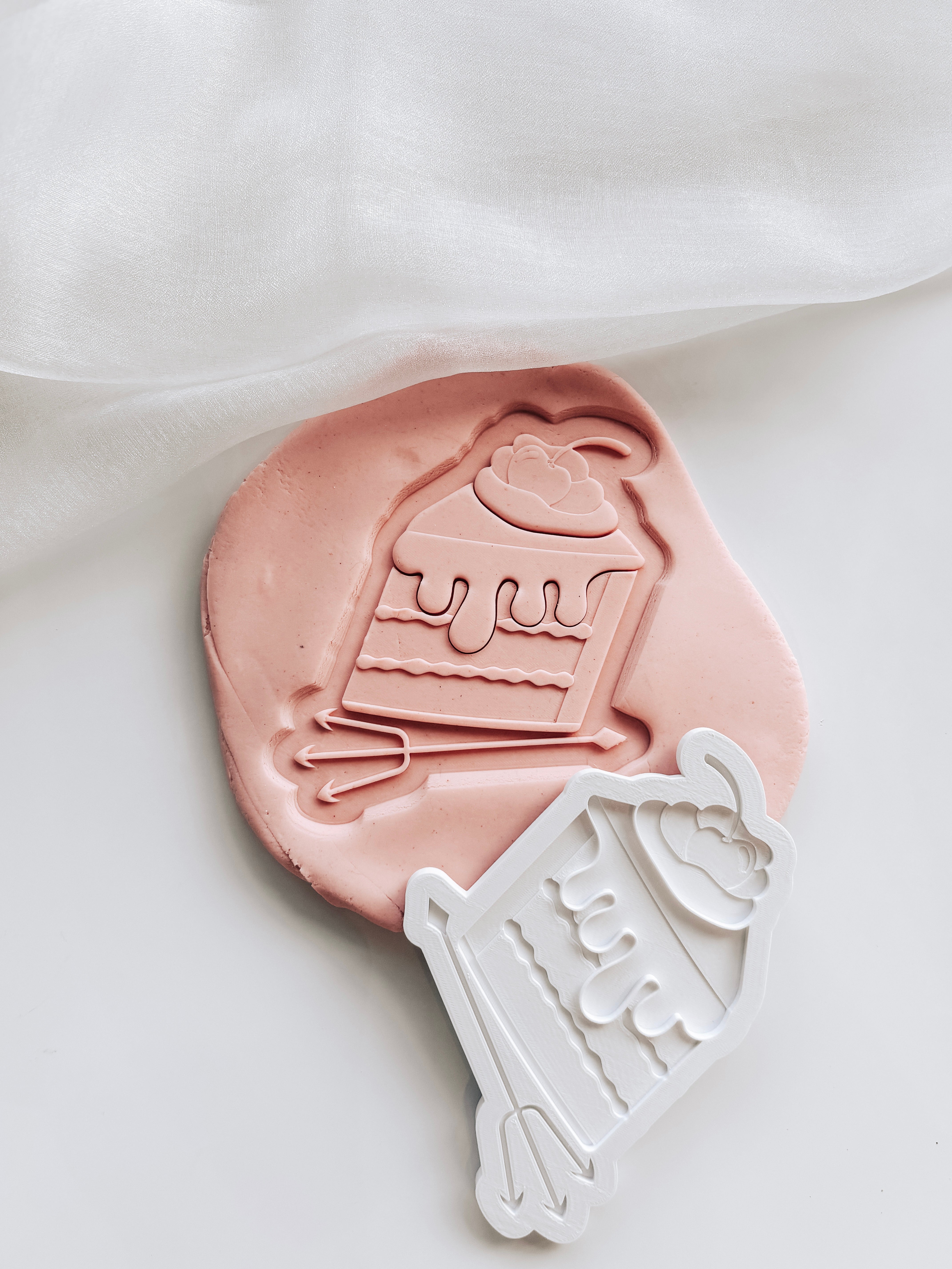 Velvet cake with devils pitchfork fork stamp and cutter
