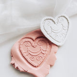 Piped cream heart shapes cake stamp and cutter