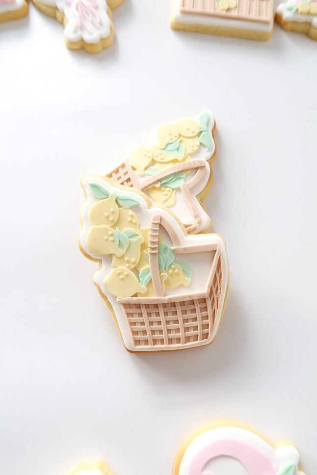 Lemons falling out of rattan basket stamp and cutter